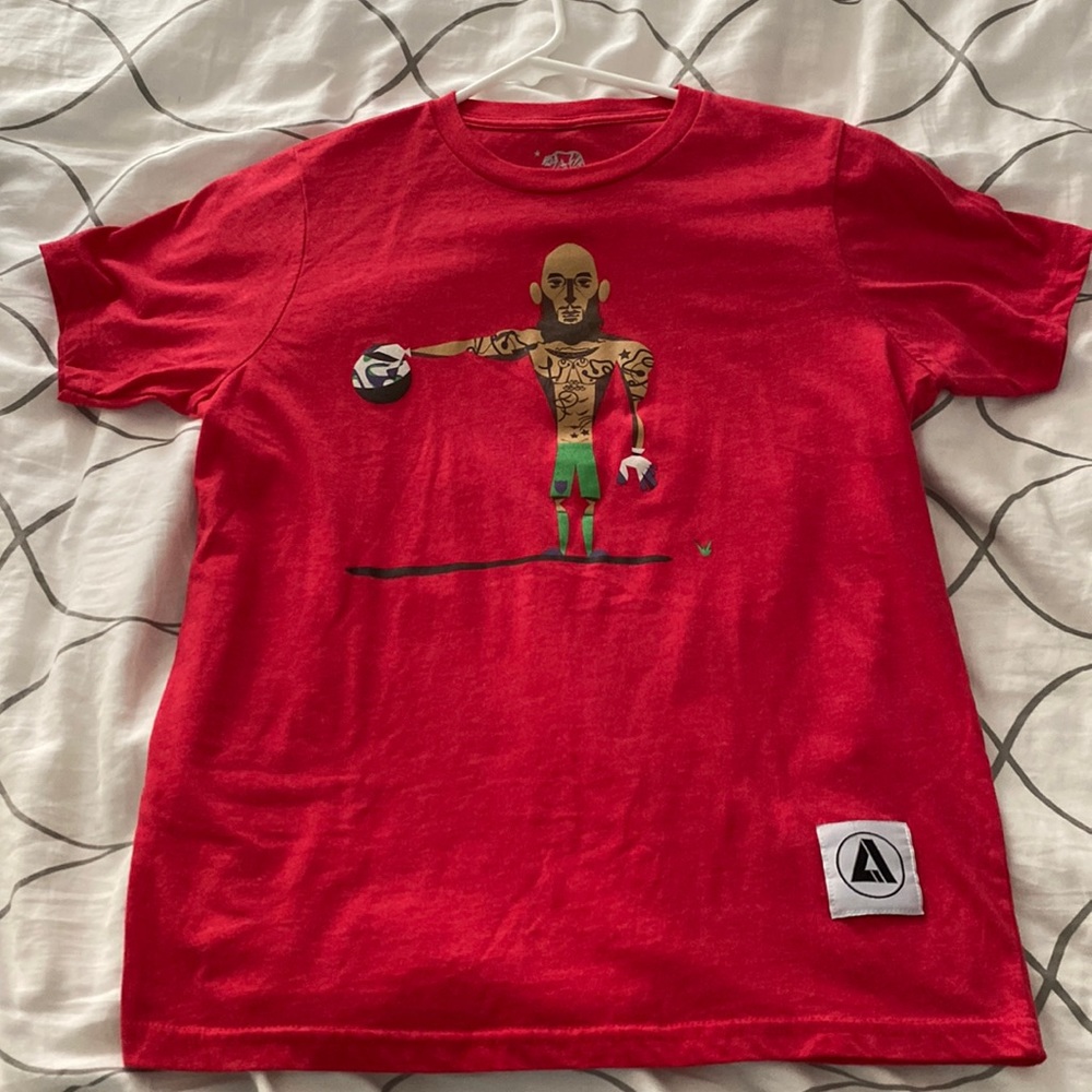 EUC Boys size XL t-shirt featuring goalkeeper Tim Howard